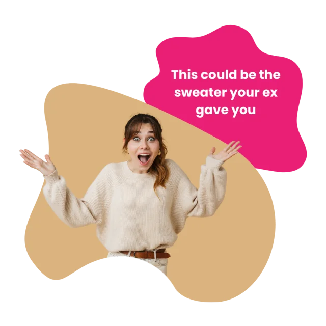 A surprised woman in a cream sweater with the label “This could be the sweater your ex gave you”