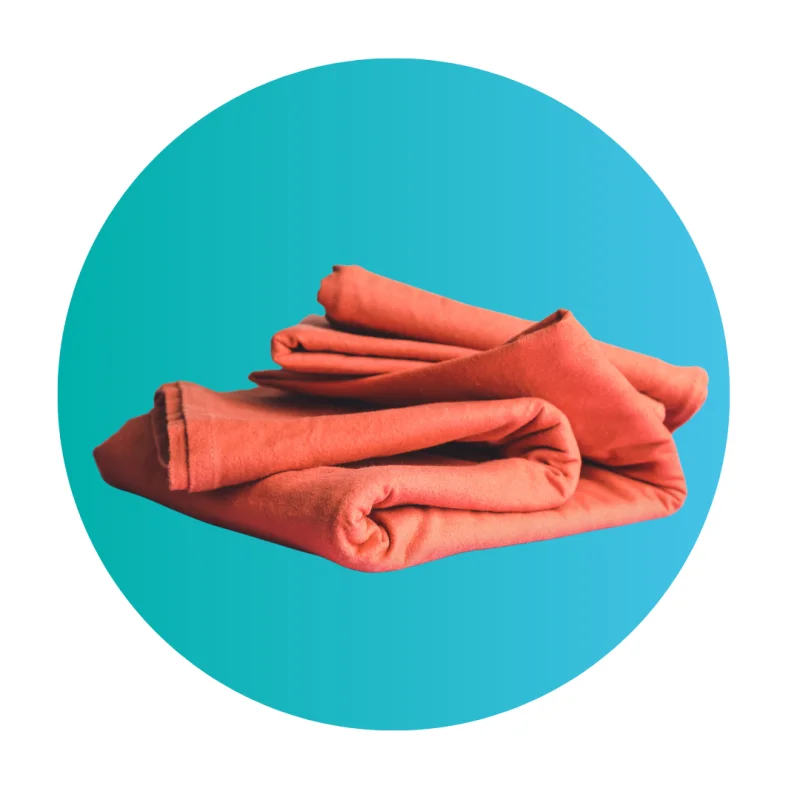 Folded orange bed linen